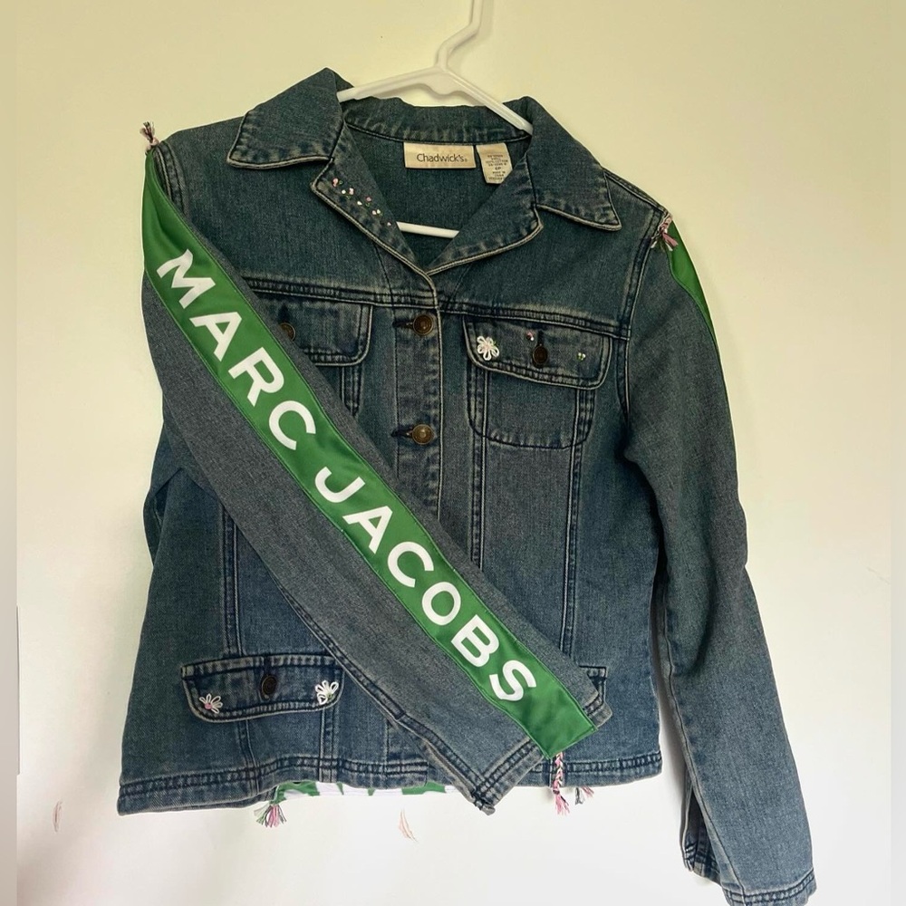 One of a kind denim jacket with Marc Jacob’s Daisy detailing